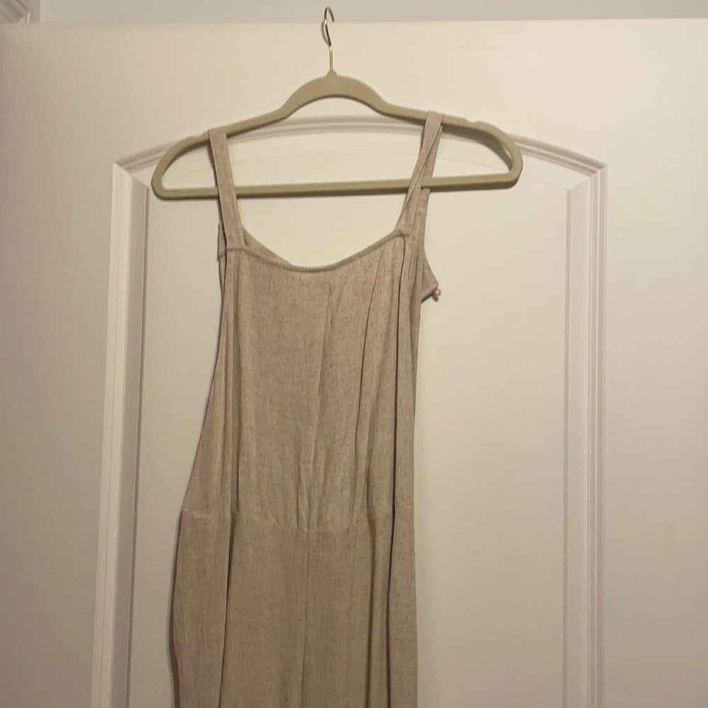 Linen jumpsuit. Size M. Very flattering.
